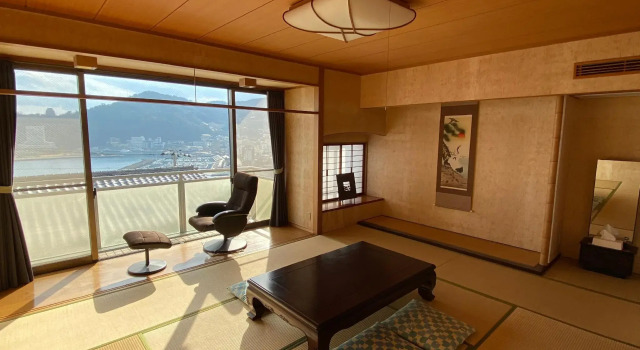 Кровать в общем номере Atami Onsen Guest House Megumi 5 minutes walk from Atami Station