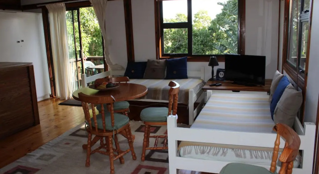 Hytte med altan Treehouse Cottage