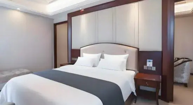 Люкс Business Gandong Hotel (Fuzhou Wenchangli Vientiane Sky Curtain Plaza Branch)