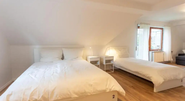 Кровать в общем номере city-house-bühl