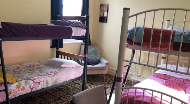 Кровать в общем номере (женский номер) Empire Hotel Backpackers