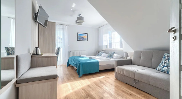 Четырёхместный номер Standard с балконом Villa Atlantis