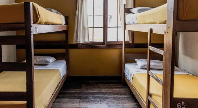 Кровать в общем номере Flying Dog Lima B&B