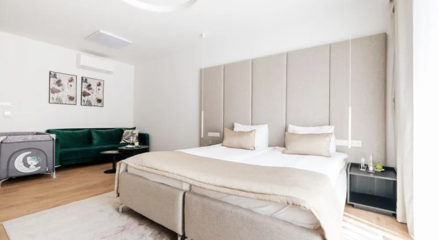 Grand cameră Adele Apartments