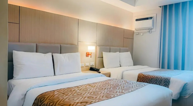 Четырёхместный номер Deluxe с видом на город Sotogrande Neopolitan Hotel Inc