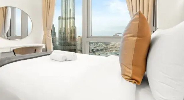 Апартаменты SML Vacation Homes - Sky High Apartments with Burj Khalifa and Dubai Fountain Views at Grande Signature, Downtown Dubai