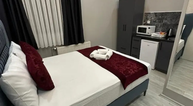 The Square 30, Забронировать Апарт-отель Апарт-отели Стамбула, рядом с Паромный порт Принцевых островов, Апарт-отель