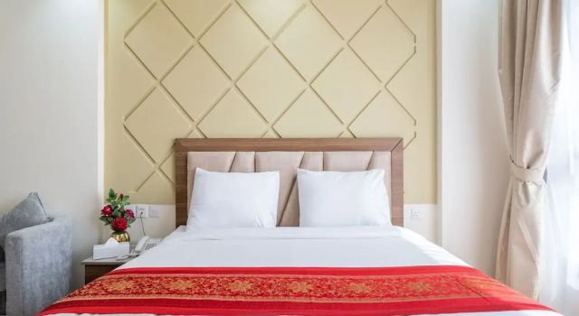 Апартаменты OYO Townhouse 156 Rose Hotel Apartments.