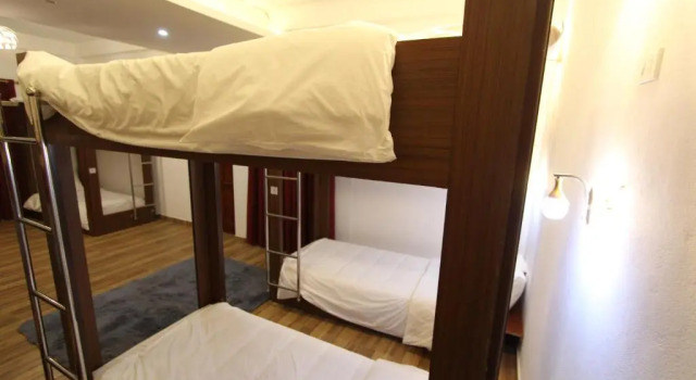 Кровать в общем номере Himalaya Sapa Hotel