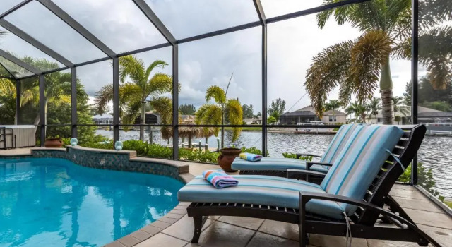 Villa Neptune's Grotto- BRAND NEW with heated Pool, Hot Tub, and dock with Tiki, Book Villa Matlacha Southwest Florida