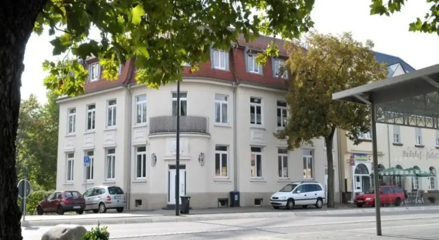Кровать в общем номере с 6 комнатами с балконом Charmante Wohnung mit eigener Terrasse