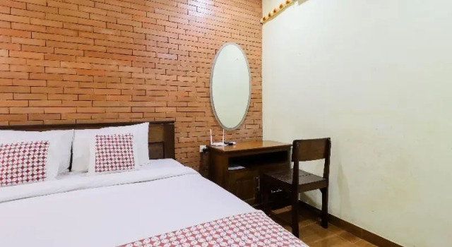 Standard Casal quarto varanda Penginapan Widodo Syariah Borobudur