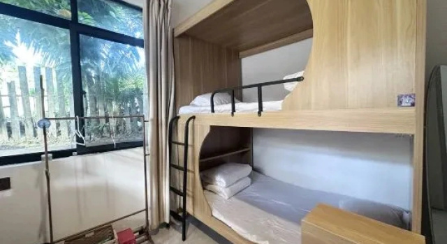 Кровать в общем номере (женский номер) Jianshan Guantao Surfing Homestay