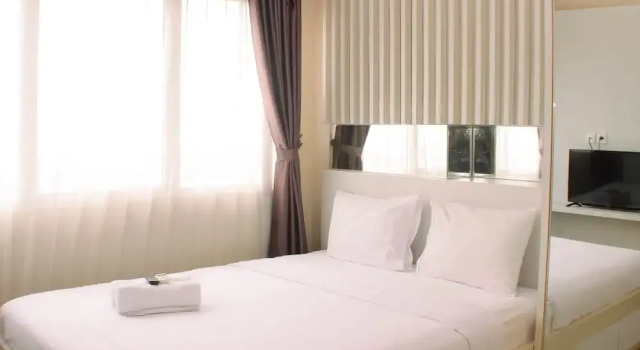 Апартаменты Cozy and Comfort Living 1BR at Oasis Cikarang Apartment By Travelio