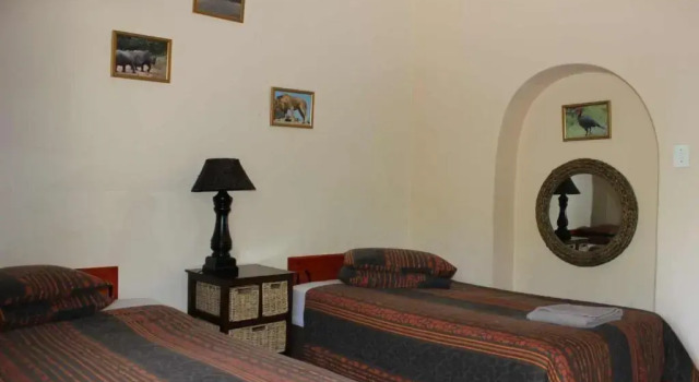 Ingwe Guesthouse, Забронировать Отель Мбомбела Мпумаланга, рядом с Mediclinic Nelspruit