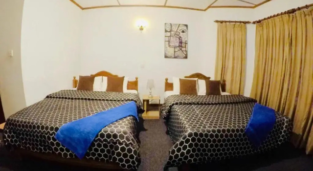 Четырёхместный номер Standard New Royal Mount Hotel