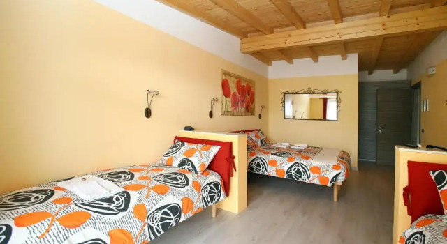 Четырёхместный номер Standard с балконом B&B La Vecchia Tipografia - Lago DIdro