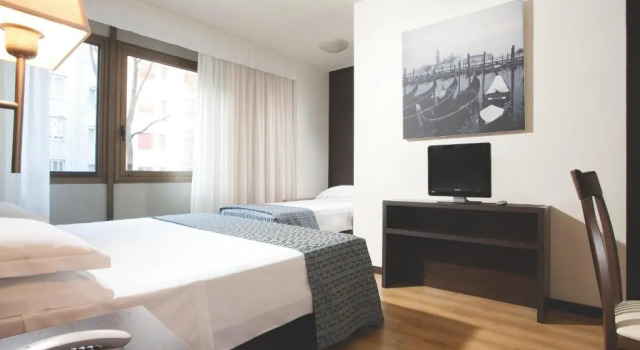 Трёхместный номер Hotel Delfino