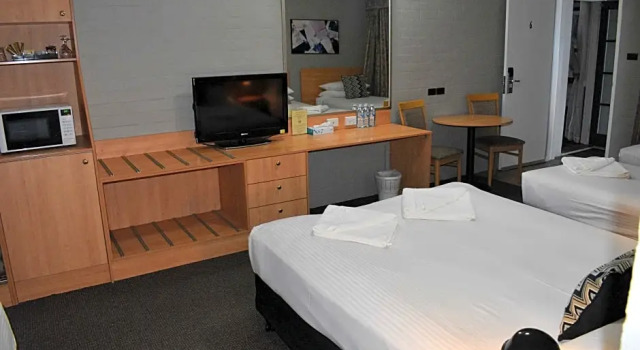 Семейный номер Deluxe Coachmans Inn Motel