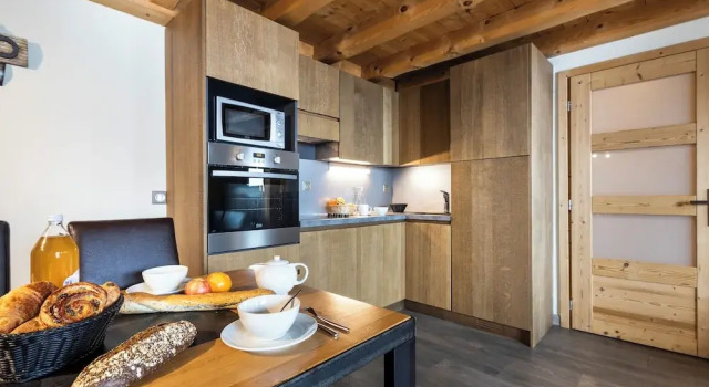 Кровать в общем номере Мансарда Chalet des Neiges Hermine