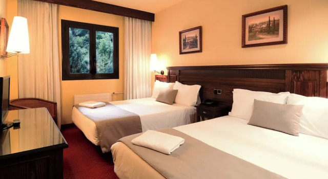 Четырёхместный семейный номер Standard RVHotels Tuca