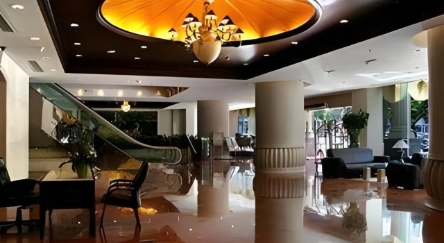 Sun City Hotel Haikou, Забронировать Отель Лунхуа Хайкоу, рядом с Haikou Pepole's Park