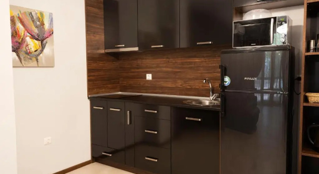 Апартаменты Цокольный этаж c 1 комнатой Green Paradise Deluxe Apartments