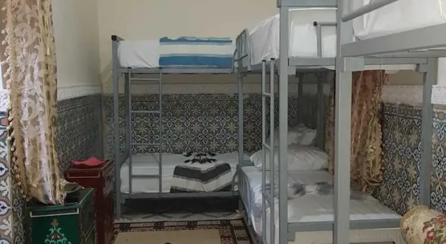 Кровать в общем номере Sun Hostel