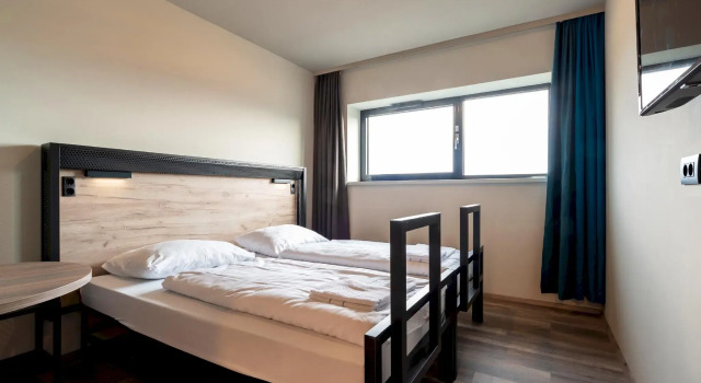 Трёхместный номер Standard harrys home Salzburg