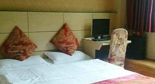 Hexie Business Hotel, Prenota Hotel Huaying Sichuan
