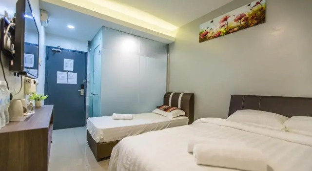 Номер Deluxe U Plus Budget Hotel