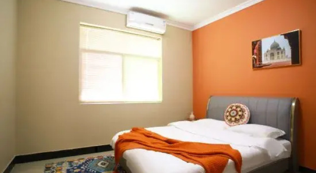 Трёхместный люкс с 2 комнатами Jiuqinju Rest Xiangyang Audiovisual Homestay (Huaihua High speed Railway  Station Branch)