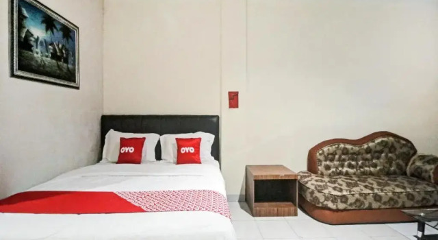 Люкс Deluxe OYO 90381 Belva Guest House