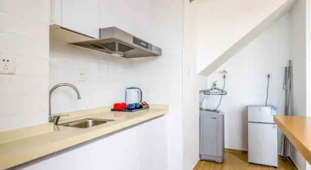 Люкс с 2 комнатами с видом на сад Huanzhu·Xiaoban Seaview Apartment (Haikouwan Poly Branch)