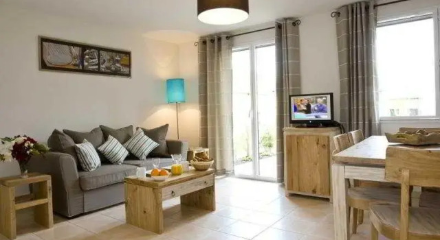 Кровать в общем номере с 3 комнатами Lagrange Vacances Les Hauts de la Houle