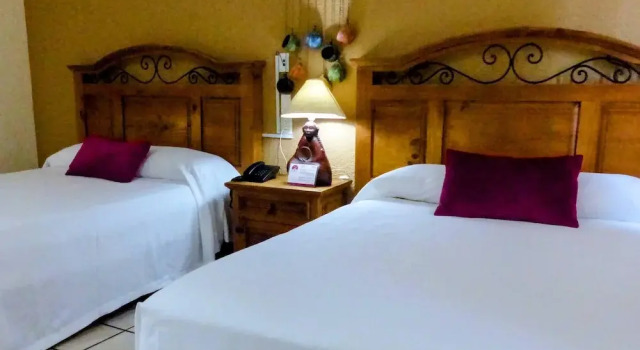 Четырёхместный номер Economy Hotel Hacienda Bugambilias La Paz