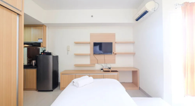 Номер Standard Cozy Minimalist Studio @ Taman Melati Margonda Apartment By Travelio