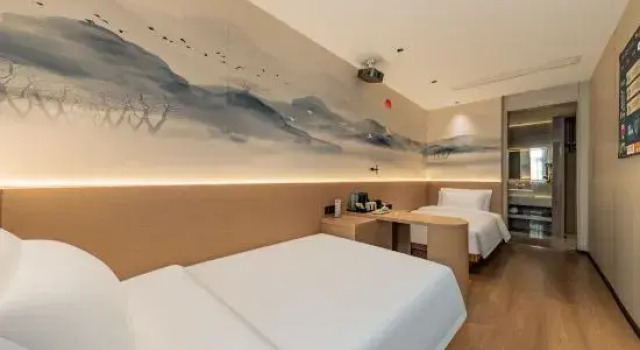 Кровать в общем номере Marriott Cloud House Hotel (Jingdezhen Ancient Kiln)
