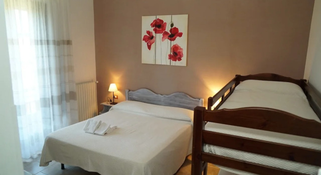 Четырёхместный номер Comfort с балконом Agriturismo La Petrosa