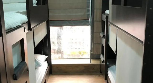 Кровать в общем номере Homy Inn Zhongxiao Dunhua