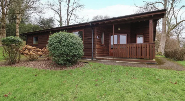 The Oak Lodge, Забронировать Дом для отпуска Отели Лайм-Риджис с парковкой, рядом с Городская мельница, Парковка