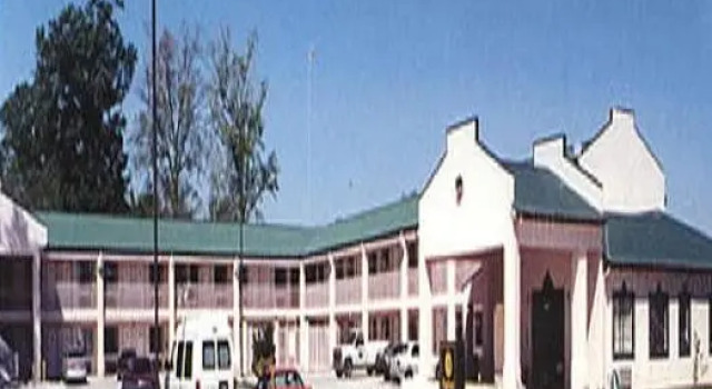 Кровать в общем номере Highland Inn Denham Springs Baton Rouge East