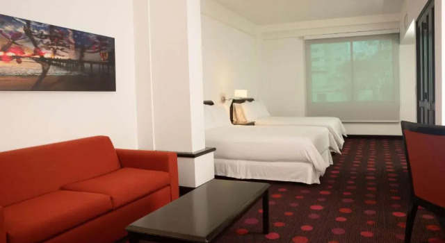 Четырёхместный люкс Radisson San Isidro Hotel & Suites