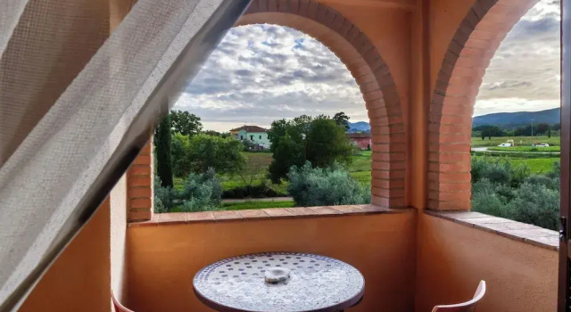 Семейные апартаменты с 2 комнатами с балконом и с видом на сад Agriturismo Bio Fattoria Casetta