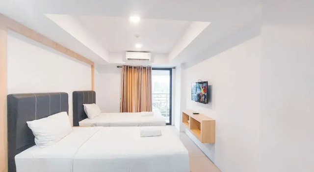 Апартаменты Standard Best Deal and Cozy Studio De Prima Apartment By Travelio