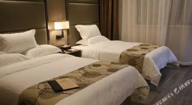 Jinji Hotel, Book Hotel Zhoupu Shanghai, nær Pusan Road Station