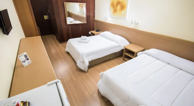 Четырёхместный номер Executive Hotel Nacional Inn Poços de Caldas - Lazer completo e Gastronomia no Centro