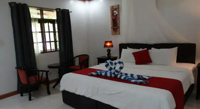 Camera Deluxe Anda White Beach Resort