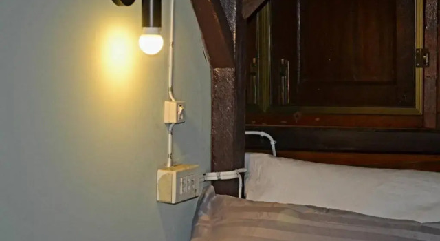 Кровать в общем номере Baan Suan Taboon Homestay