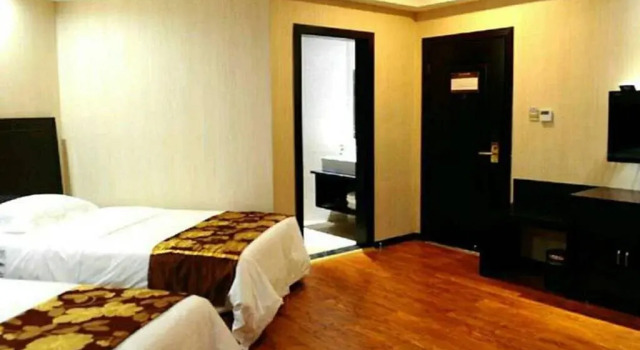 Xichang Xiaoding Business Hotel, Reservar Hotel Hotéis em Xichang com estacionamento, Estacionamento